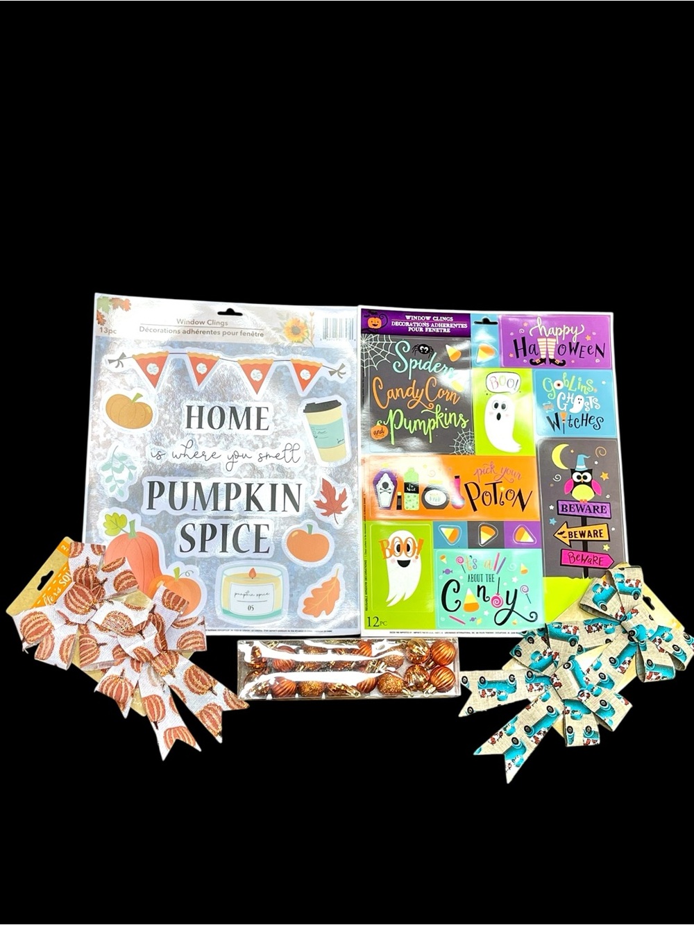 Bundle of fall Halloween decoration items window clings bows orange ornaments